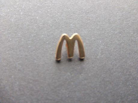 McDonald's logo goudkleurig